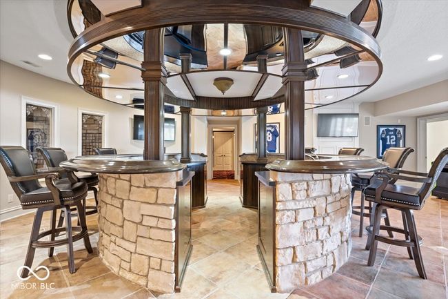 Circular bar on the lower level is the perfect place to entertain. | Image 25