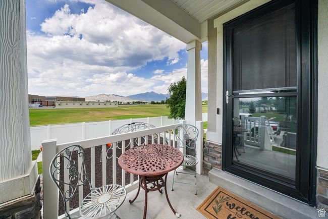 Porch featuring a mountain view | Image 4