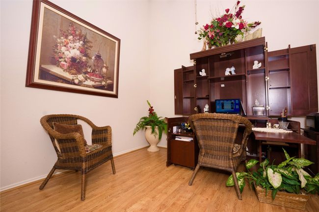 Office with light wood finished floors and baseboards | Image 7