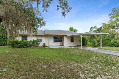 9040 Sw 209th Circle, House other with 4 bedrooms, 2 bathrooms and 1 parking in Dunnellon FL | Image 1