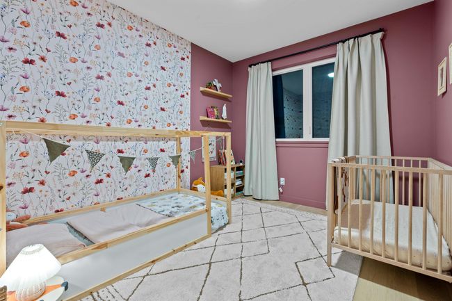 Bedroom featuring a nursery area | Image 24