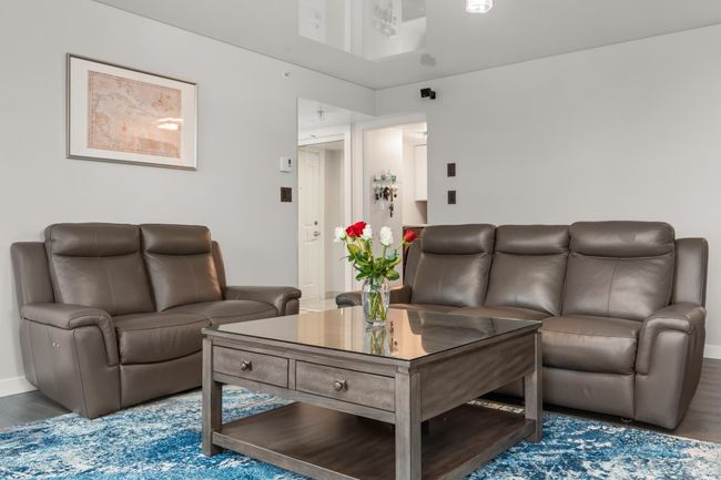 Living room featuring baseboards and wood finished floors | Image 12