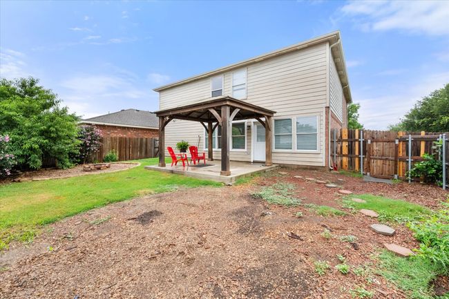 Back of property with a gazebo, a patio, and a fenced backyard | Image 30