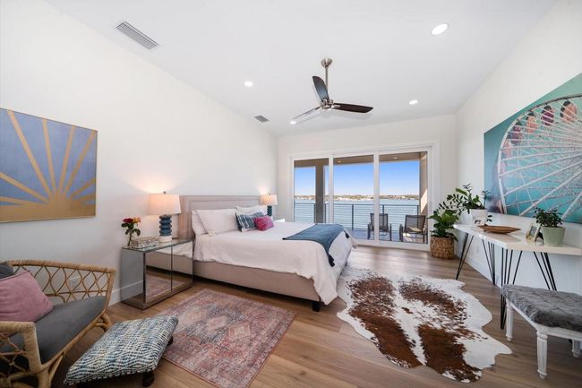 Primary Suite with balcony on the bay. Wake up to beautiful sunrise every morning! | Image 52