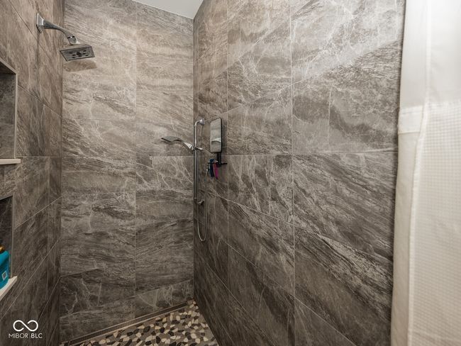 bathroom with tiled shower | Image 23