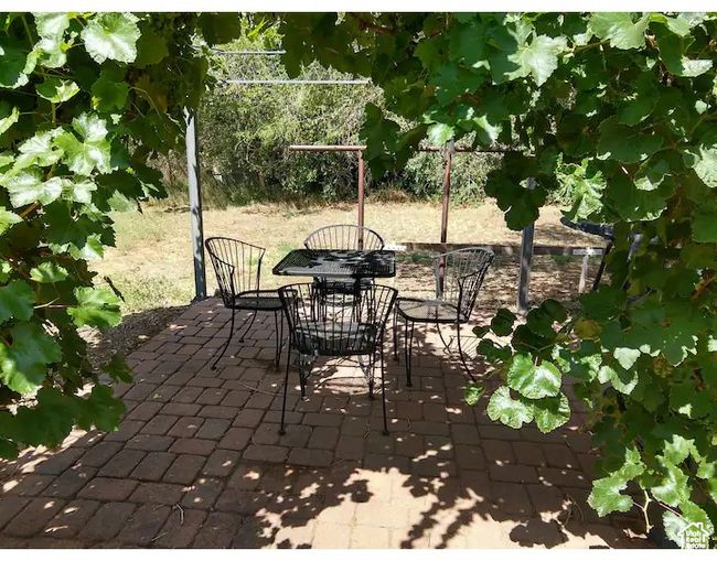 View of patio featuring outdoor dining space | Image 17