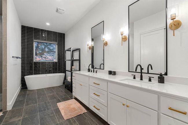 Primary Bathroom with designer finish out and large walk in closet. | Image 22