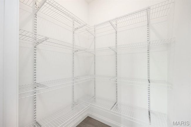 Walk in pantry with ample shelving | Image 13