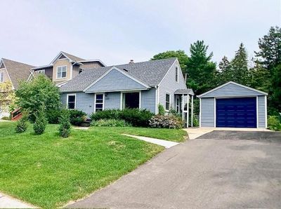 FRONT ELEVATION WITH FRONT AND SIDE DOOR ENTRANCES NICELY LANDSCAPED NEWER ROOF SIDING WINDOWS GUTTERS DOORS.jpg | Image 2