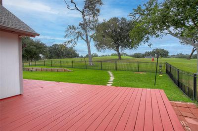 Back patio with golf course views | Image 3