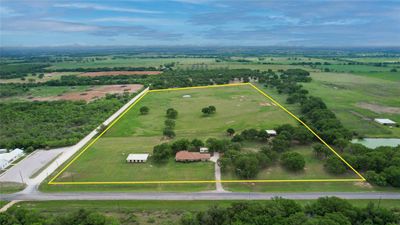 Birds eye view of property with a water view and a rural view | Image 1