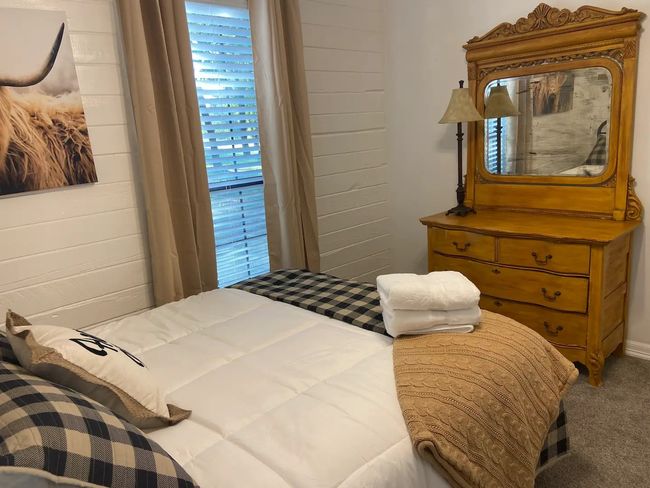 Bedroom featuring carpet floors | Image 16