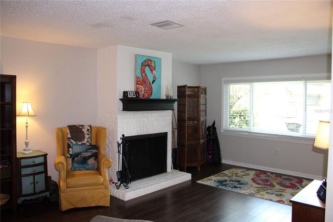 New Hurricane Impact glass windows. Real wood burning fireplace | Image 10
