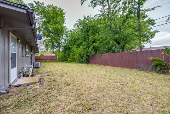View of yard featuring central AC | Image 22