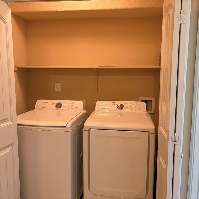 Washroom featuring washer and dryer | Image 5