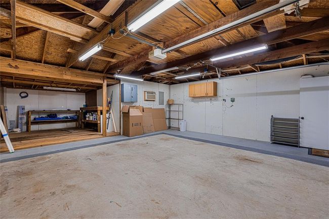2 car garage with added storage space in the back | Image 45