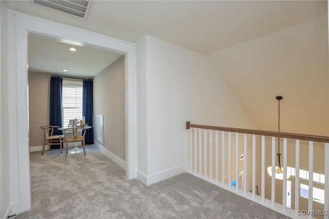 The second floor features a loft, an additional bedroom with walk-in closet and a full bath with tub/shower combo. | Image 21