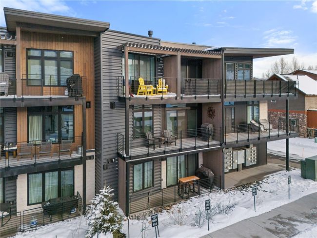 View of snow covered property | Image 26