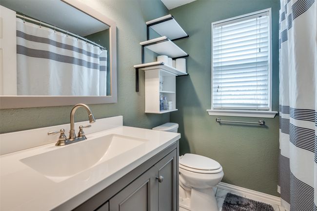 Full bath with vanity and tile patterned flooring | Image 18