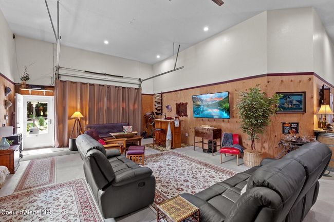 Family Area looking towards front man door and 12x10 Overhead Door | Image 5