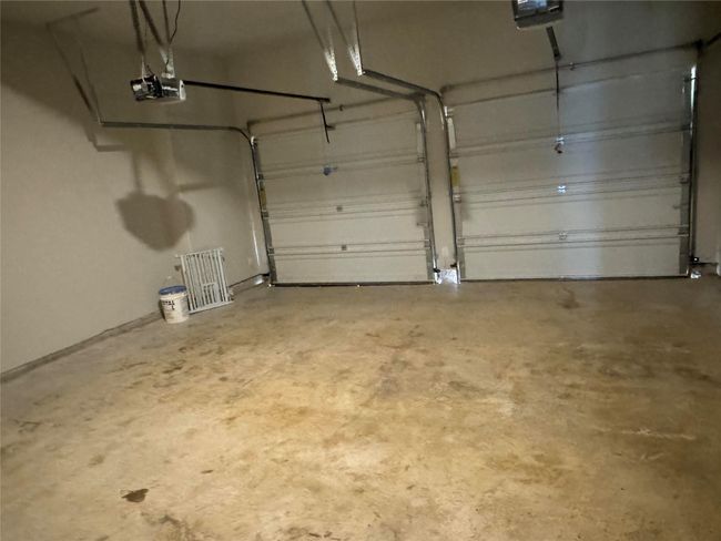 Garage featuring a garage door opener | Image 31