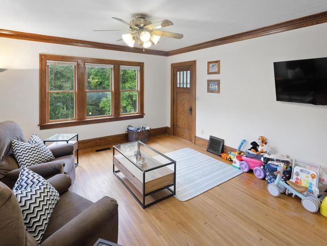Living room. Lots of windows which provide tons of natural light | Image 34