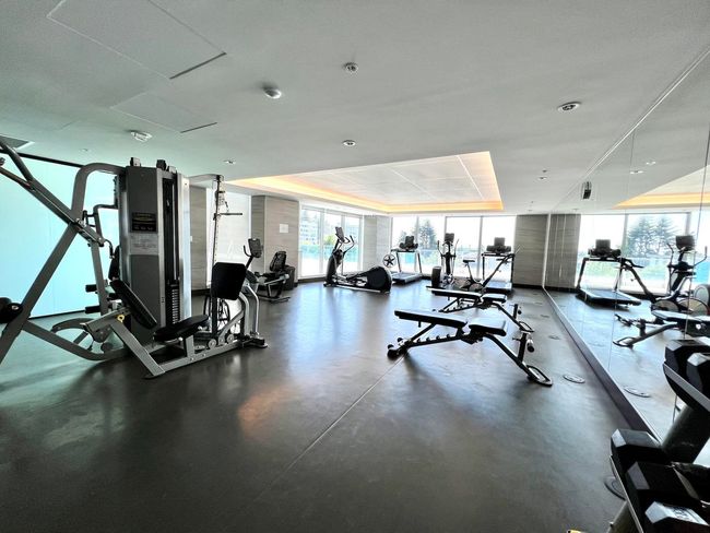 Workout area featuring expansive windows | Image 18