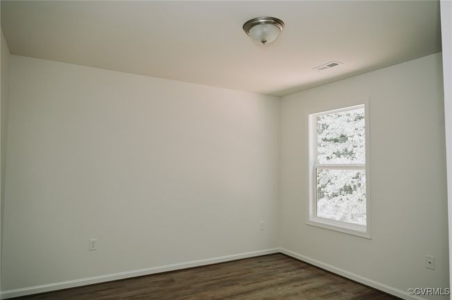 Empty room featuring dark wood-type flooring | Image 10