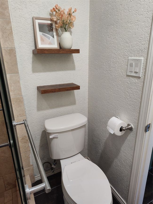 Bathroom featuring toilet | Image 14
