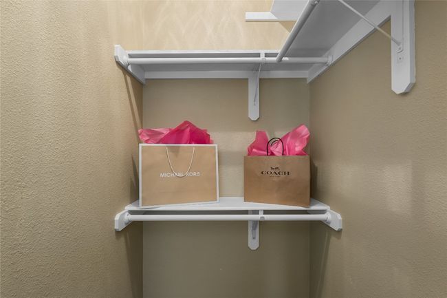 View of walk in closet | Image 24