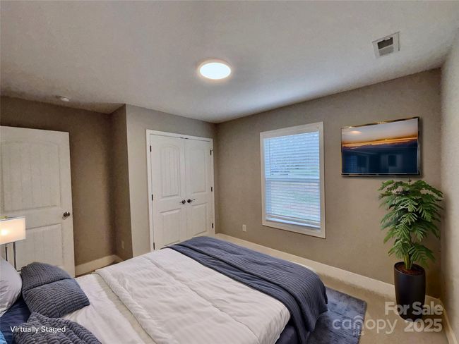 Bedroom with large closet. | Image 11