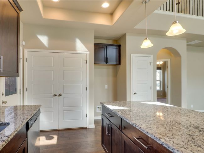 Washer / Dryer area near kitchen | Image 10