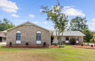 Beautifully Landscaped front and back | Image 1