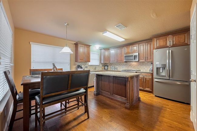 1402 Merryglen Ct, House other with 3 bedrooms, 3 bathrooms and 2 parking in Spring TX | Image 9