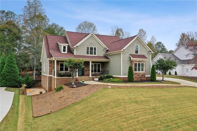 7620 Pleasant Hollow Lane, House other with 4 bedrooms, 3 bathrooms and null parking in Cumming GA | Image 1