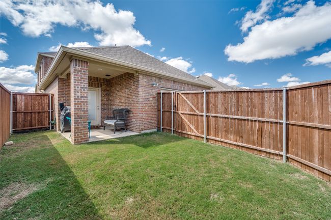 View of yard featuring a patio and a fenced backyard | Image 25