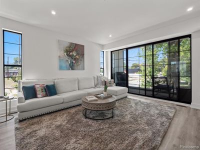 Living room with two picture windows on South wall | Image 3