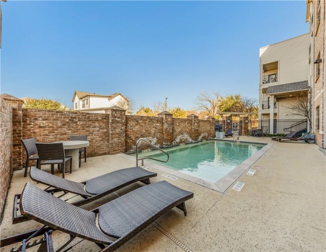 View of pool featuring a patio area | Image 37