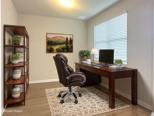 Office area with LVP floors and baseboards | Image 8
