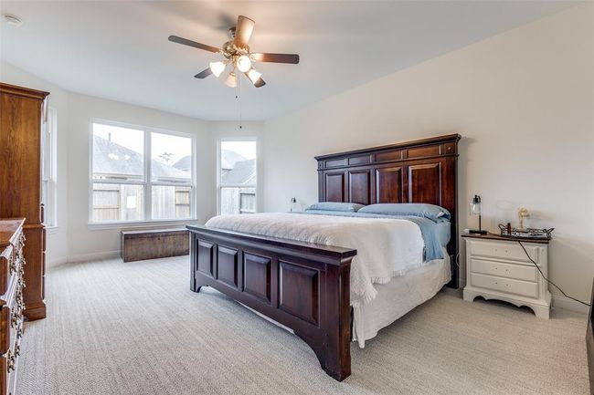 Master bedroom with bay windows for extra room. | Image 15