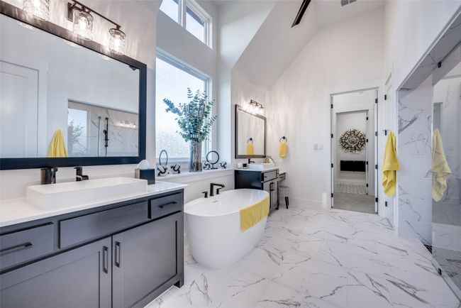Stunning primary bath with free standing tub and walk in shower | Image 15