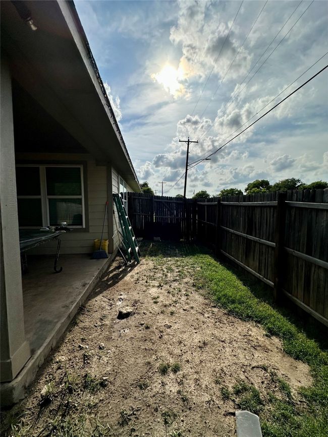 Fenced backyard featuring a patio | Image 37