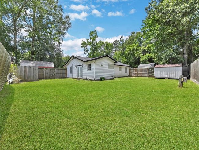 27015 Coach Light Ln, House other with 3 bedrooms, 2 bathrooms and null parking in New Caney TX | Image 29