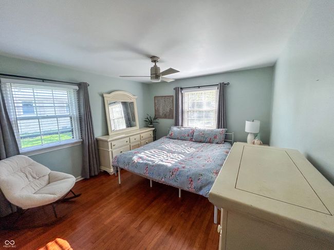 Large primary bedroom, featuring hardwood floors | Image 16
