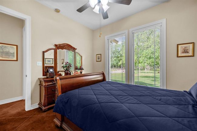 3rd bedroom with two large windows. | Image 32