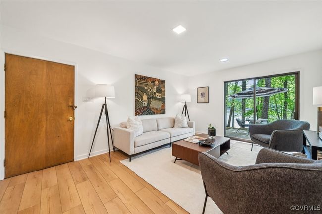 Living room featuring light wood-style​​‌​​​​‌​​‌‌​‌‌​​​‌‌​​‌‌​‌​​​​​‌ flooring | Image 12