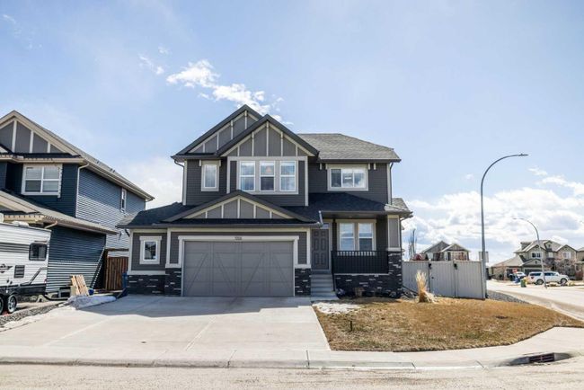 556 Boulder Creek Bay Se, Home with 3 bedrooms, 2 bathrooms and 4 parking in Langdon AB | Image 1