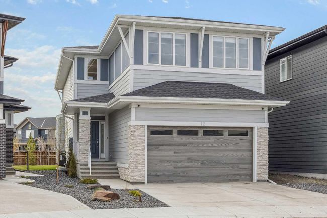 12 Creekstone Cove Sw, Home with 5 bedrooms, 3 bathrooms and 4 parking in Calgary AB | Image 1