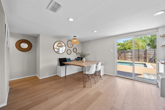 Dining room features a built-in bench seating! | Image 13