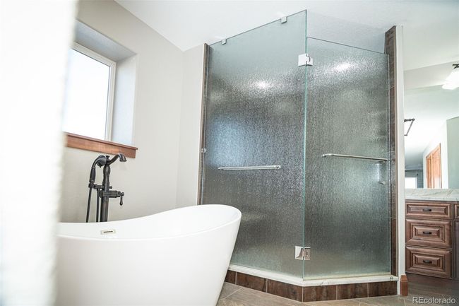 295 S County Road 129, House other with 3 bedrooms, 3 bathrooms and 12 parking in Bennett CO | Image 13